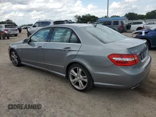 2012 Mercedes-Benz E 350 Luxury with VIN WDDHF5KB7CA548837, listed as a Copart auction lot 60436735 with 147,123 mi miles and Salvage title. Bid and sale history available at DreamBid. Image 2.