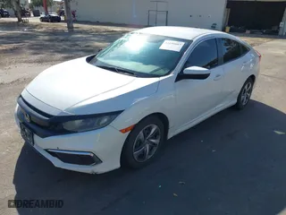2019 Honda Civic Sedan LX with VIN 2HGFC2F66KH546486, listed as a IAAI auction lot 41690887 with 128,096 mi miles. Bid and sale history available at carsss.com. Image 19.