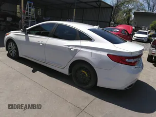 2014 Hyundai Azera with VIN KMHFG4JG8EA346609, listed as a IAAI auction lot 42010249 with 105,646 mi miles and . Bid and sale history available at DreamBid. Image 3.