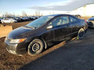 2008 Honda Civic Cpe DX with VIN 2HGFG12258H007657, listed as a Copart auction lot 76782534 with 181,987 mi miles and Salvage Title. Bid and sale history available at carsss.com. Image 1.