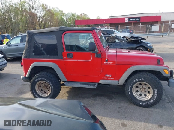 2003 Jeep Wrangler Sport with VIN 1J4FA49S13P320159, listed as a IAAI auction lot 41935699 with 212,355 mi miles. Bid and sale history available at carsss.com. Image 13.