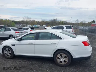 2016 Ford Sedan Police Interceptor with VIN 1FAHP2MK0GG116974, listed as a IAAI auction lot 42044185 with 161,699 mi miles. Bid and sale history available at carsss.com. Image 14.