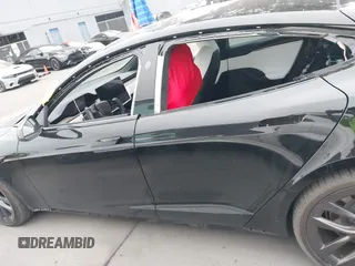 2022 Tesla Model S with VIN 5YJSA1E55NF474342, listed as a IAAI auction lot 41870994 with 33,804 mi miles and . Bid and sale history available at DreamBid. Image 15.