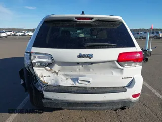 2019 Jeep Grand Cherokee Laredo E with VIN 1C4RJFAG7KC694674, listed as a IAAI auction lot 41591678 with 61,144 mi miles. Bid and sale history available at carsss.com. Image 16.