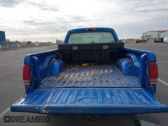 1999 Dodge Dakota with VIN 1B7GG26X5XS296142, listed as a IAAI auction lot 41486667 with 185,436 mi miles and . Bid and sale history available at carsss.com. Image 8.