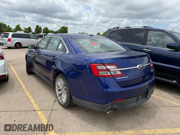 2014 Ford Taurus Limited with VIN 1FAHP2F84EG141388, listed as a Copart auction lot 61052645 with 112,876 mi miles and Clean title. Bid and sale history available at DreamBid. Image 3.