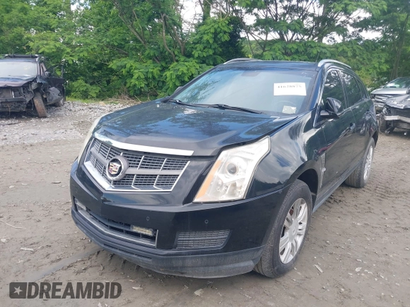 2012 Cadillac SRX Luxury Collection z VIN 3GYFNAE35CS587033, wystawiony jako IAAI lot #41628875 z przebiegiem 161 985 mil mil oraz . Historia ofert i sprzedaży dostępna na DreamBid. Obrazek 2.