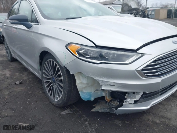 2018 Ford Fusion Titanium with VIN 3FA6P0D99JR139114, listed as a IAAI auction lot 41991248 with 142,324 mi miles. Bid and sale history available at carsss.com. Image 6.