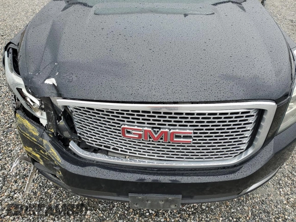 2016 GMC Yukon XL Denali with VIN 1GKS2HKJ1GR199710, listed as a Copart auction lot 49172615 with 261,856 mi miles and Salvage Title. Bid and sale history available at DreamBid. Image 13.