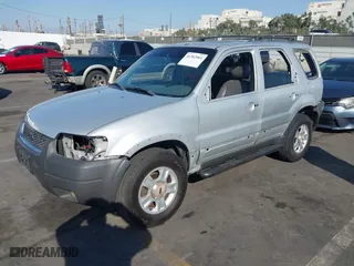 2002 Ford Escape XLT Choice with VIN 1FMYU03112KC92109, listed as a IAAI auction lot 41382961 with 105,145 mi miles. Bid and sale history available at carsss.com. Image 2.