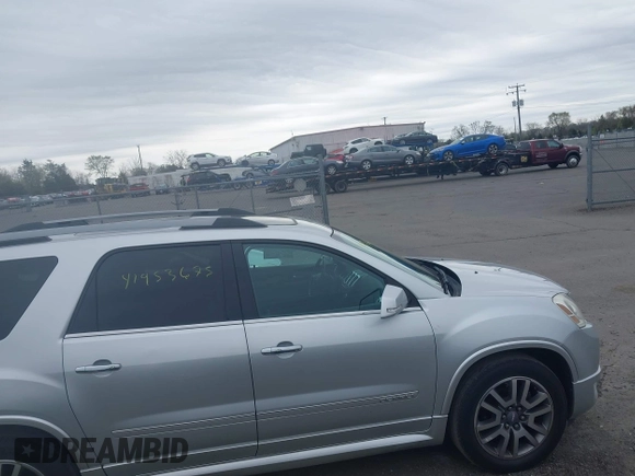2012 GMC Acadia Denali with VIN 1GKKVTED4CJ227752, listed as a IAAI auction lot 41953675 with 219,344 mi miles. Bid and sale history available at carsss.com. Image 13.