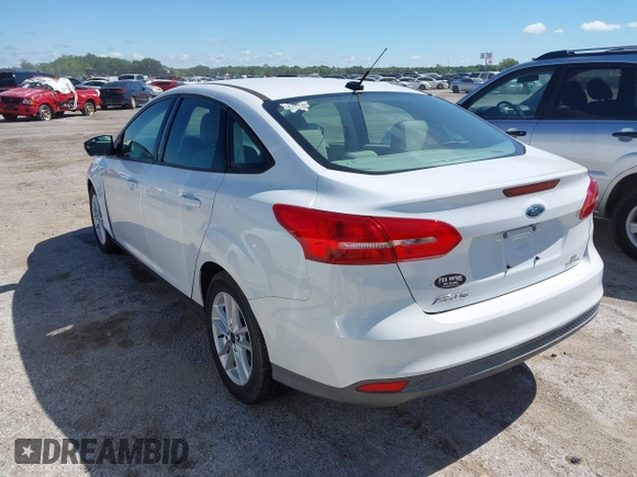 2015 Ford Focus SE with VIN 1FADP3F26FL289857, listed as a IAAI auction lot 42206474 with 111,287 mi miles and . Bid and sale history available at DreamBid. Image 3.