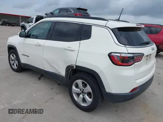 2019 Jeep Compass Latitude with VIN 3C4NJCBB9KT652088, listed as a IAAI auction lot 42162439 with 97,276 mi miles and . Bid and sale history available at DreamBid. Image 3.