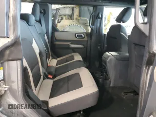 2022 Ford Bronco z VIN 1FMEE5DPXNLB55992, wystawiony jako Copart lot #62194195 z przebiegiem 70 264 mil mil oraz Szkoda całkowita • Salvage title. Historia ofert i sprzedaży dostępna na DreamBid. Obrazek 11.