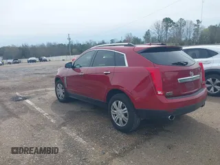 2013 Cadillac SRX Luxury Collection with VIN 3GYFNCE32DS510701, listed as a IAAI auction lot 41861332 with 154,362 mi miles and . Bid and sale history available at carsss.com. Image 3.