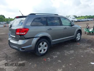 2012 Dodge Journey SXT with VIN 3C4PDDBG2CT146220, listed as a IAAI auction lot 42661371 with 103,378 mi miles and . Bid and sale history available at DreamBid. Image 4.