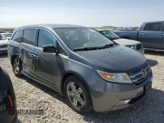 2012 Honda Odyssey Touring с VIN 5FNRL5H95CB120347, выставлен на аукционе Copart как лот 59111775 с пробегом 208 419 миль миль и Списание • Salvage title. История ставок и продаж доступна на DreamBid. Изображение 4.
