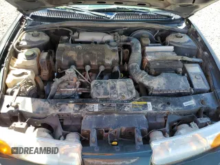2000 Saturn SL with VIN 1G8ZH5285YZ240565, listed as a Copart auction lot 66567153 with 202,109 mi miles and Salvage title. Bid and sale history available at DreamBid. Image 11.