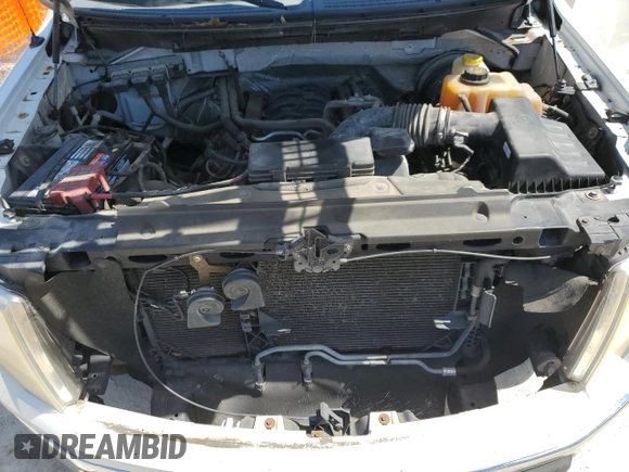 2014 Ford F-150 XL with VIN 1FTNF1CF6EKD16492, listed as a Copart auction lot 64820745 with 209,629 mi miles and Salvage title. Bid and sale history available at DreamBid. Image 11.