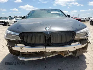 2019 BMW 5 Series M550i xDrive with VIN WBAJB9C51KB287797, listed as a Copart auction lot 65382465 with 61,459 mi miles and Salvage title. Bid and sale history available at DreamBid. Image 5.
