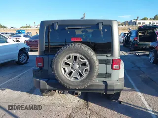 2014 Jeep Wrangler Unlimited Rubicon X with VIN 1C4BJWFG3EL134522, listed as a IAAI auction lot 41221381 with 66,897 mi miles and . Bid and sale history available at DreamBid. Image 16.