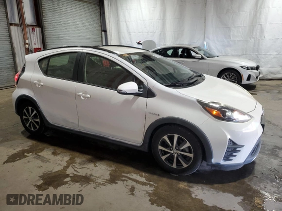 2018 Toyota Prius One with VIN JTDKDTB37J1599450, listed as a Copart auction lot 52892275 with 95,861 mi miles and Clean Title. Bid and sale history available at DreamBid. Image 4.