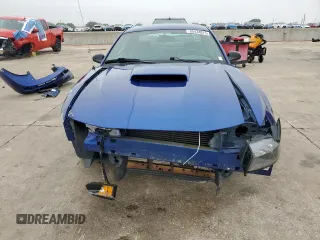 2004 Ford Mustang GT Deluxe z VIN 1FAFP42X74F232580, wystawiony jako Copart lot #55434075 z przebiegiem 83 948 mil mil oraz Szkoda całkowita • Salvage title. Historia ofert i sprzedaży dostępna na DreamBid. Obrazek 5.