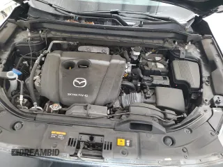 2021 Mazda CX-5 Touring with VIN JM3KFBCM5M0343577, listed as a Copart auction lot 52411005 with 70,372 mi miles and Clean Title. Bid and sale history available at carsss.com. Image 12.