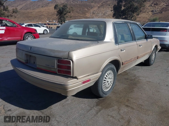 1993 Oldsmobile Cutlass Ciera S with VIN 1G3AG55N6P6421424, listed as a IAAI auction lot 41341670 with 221,301 mi miles and . Bid and sale history available at DreamBid. Image 4.