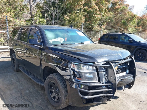 2019 Chevrolet Tahoe Commercial with VIN 1GNLCDECXKR133529, listed as a IAAI auction lot 41890263 with 160,227 mi miles. Bid and sale history available at carsss.com. Image 1.