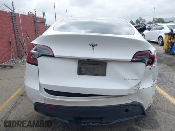 2023 Tesla Model Y Long Range with VIN 7SAYGAEE9PF702910, listed as a IAAI auction lot 42199519 with 91,094 mi miles and . Bid and sale history available at DreamBid. Image 16.