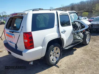 2013 Chevrolet Tahoe LT with VIN 1GNSKBE02DR280326, listed as a IAAI auction lot 42051269 with Not provided miles and . Bid and sale history available at DreamBid. Image 4.