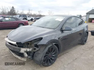 2023 Tesla Model Y Performance with VIN 7SAYGDEF2PF757113, listed as a IAAI auction lot 41881175 with 54,809 mi miles and . Bid and sale history available at DreamBid. Image 6.