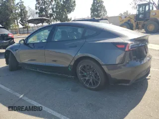 2025 Tesla Model 3 Long Range with VIN 5YJ3E1EA8SF896333, listed as a Copart auction lot 61876445 with 5,690 mi miles and Salvage title. Bid and sale history available at DreamBid. Image 2.