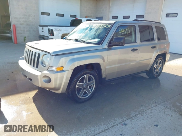 2009 Jeep Patriot Sport with VIN 1J4FT28B59D195435, listed as a IAAI auction lot 40758450 with 130,728 mi miles. Bid and sale history available at carsss.com. Image 2.