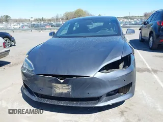 2017 Tesla Model S 100D with VIN 5YJSA1E20HF198503, listed as a IAAI auction lot 41843782 with 77,281 mi miles and . Bid and sale history available at DreamBid. Image 13.