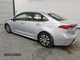 2021 Toyota Corolla Hybrid LE with VIN JTDEAMDE4MJ009929, listed as a Copart auction lot 59626985 with 91,817 mi miles and Clean title. Bid and sale history available at DreamBid. Image 2.