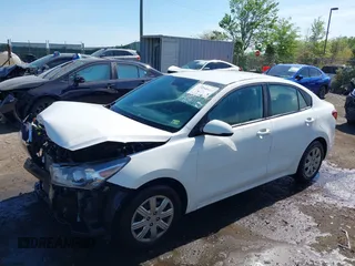 2022 Kia Rio S with VIN 3KPA24AD7NE492807, listed as a IAAI auction lot 42050520 with 100,756 mi miles. Bid and sale history available at carsss.com. Image 2.