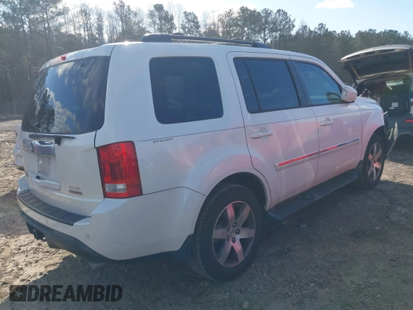 2013 Honda Pilot Touring with VIN 5FNYF3H95DB012903, listed as a IAAI auction lot 41732433 with 160,805 mi miles and . Bid and sale history available at carsss.com. Image 4.