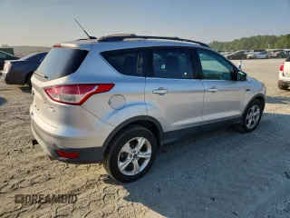 2013 Ford Escape SE z VIN 1FMCU9G92DUD07397, wystawiony jako Copart lot #63110315 z przebiegiem 167 296 mil mil oraz Czysty tytuł • Clean title. Historia ofert i sprzedaży dostępna na DreamBid. Obrazek 3.