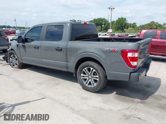 2021 Ford F-150 XL with VIN 1FTEW1CP3MFA80786, listed as a IAAI auction lot 42061952 with 32,071 mi miles. Bid and sale history available at carsss.com. Image 3.