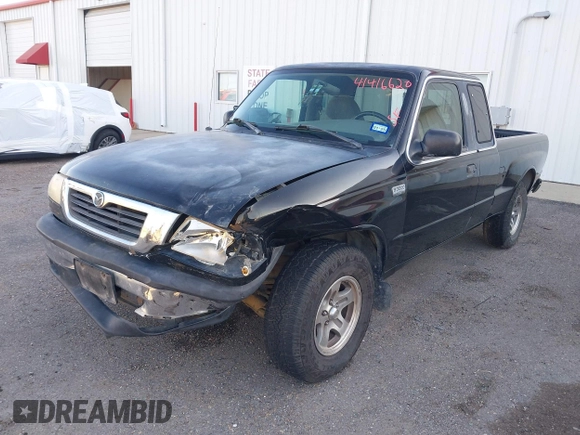 1999 Mazda B-Series 2WD Truck SE with VIN 4F4YR16V8XTM09770, listed as a IAAI auction lot 41416620 with 245,604 mi miles. Bid and sale history available at carsss.com. Image 18.