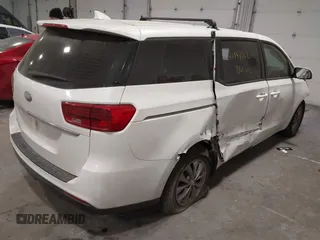 2019 Kia Sedona L with VIN KNDMA5C1XK6524868, listed as a IAAI auction lot 41048602 with 82,511 mi miles. Bid and sale history available at carsss.com. Image 4.