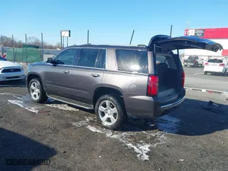 2018 Chevrolet Tahoe Premier with VIN 1GNSCCKC5JR204676, listed as a IAAI auction lot 41731192 with 130,528 mi miles. Bid and sale history available at carsss.com. Image 3.