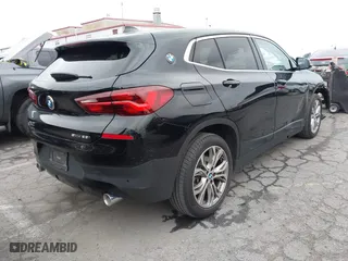 2020 BMW X2 sDrive28i with VIN WBXYH9C08L5R62746, listed as a IAAI auction lot 41788571 with 20,981 mi miles. Bid and sale history available at carsss.com. Image 4.