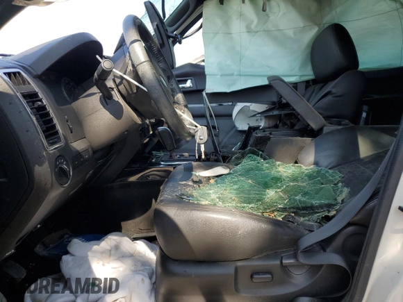 2010 Ford Escape Limited with VIN 1FMCU9EG5AKD32965, listed as a Copart auction lot 59765695 with Not provided miles and Salvage title. Bid and sale history available at DreamBid. Image 7.