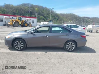 2015 Toyota Camry XLE with VIN 4T4BF1FK2FR495004, listed as a IAAI auction lot 42083465 with 114,941 mi miles and . Bid and sale history available at DreamBid. Image 14.