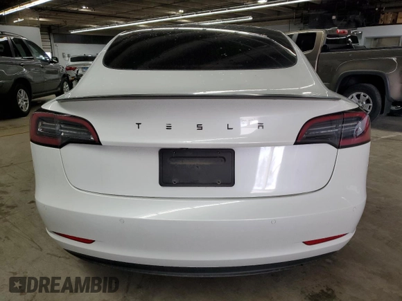 2021 Tesla Model 3 Standard Range Plus z VIN 5YJ3E1EA4MF943036, wystawiony jako Copart lot #54008355 z przebiegiem 62 981 mil mil oraz Szkoda całkowita • Salvage title. Historia ofert i sprzedaży dostępna na DreamBid. Obrazek 6.