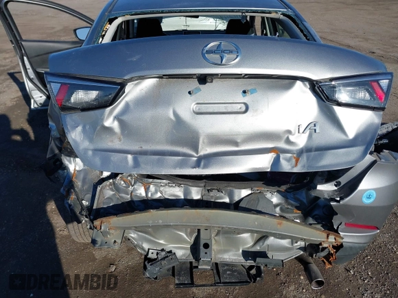 2016 Scion iA with VIN 3MYDLBZV5GY129856, listed as a IAAI auction lot 41624817 with 69,686 mi miles. Bid and sale history available at carsss.com. Image 6.