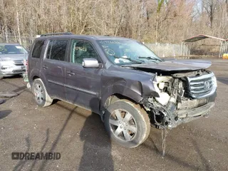 2015 Honda Pilot Touring with VIN 5FNYF4H96FB048883, listed as a IAAI auction lot 41796626 with 167,875 mi miles. Bid and sale history available at carsss.com. Image 1.